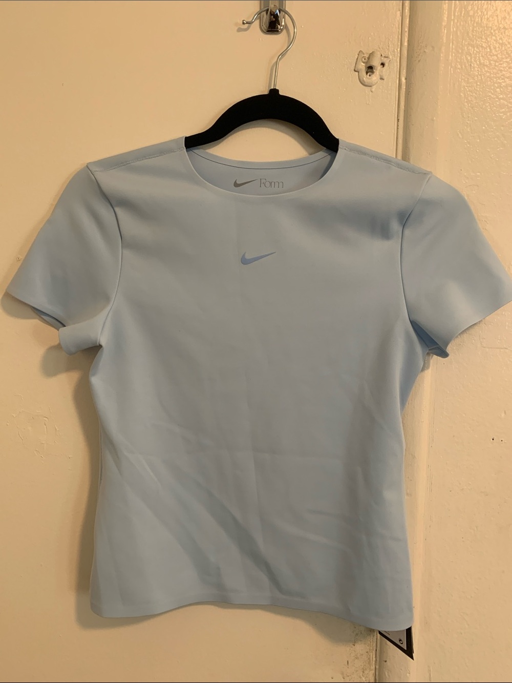 Women’s Nike form stealth tight fit tee in baby blue! NWT